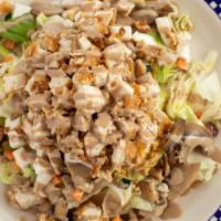 Sesame Chicken · Sesame chicken, chopped lettuce, carrots, cucumber, portobello mushroom, fresh mozzarella, a...