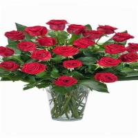 Grande Roses - 2 Dozen Roses · Two dozen premium roses designed with specialty foliage in a clear vase.