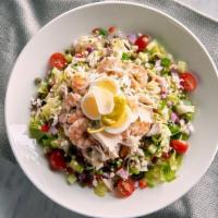Seafood Chopped Salad · Crabmeat, shrimp, feta cheese, and Greek vinaigrette.