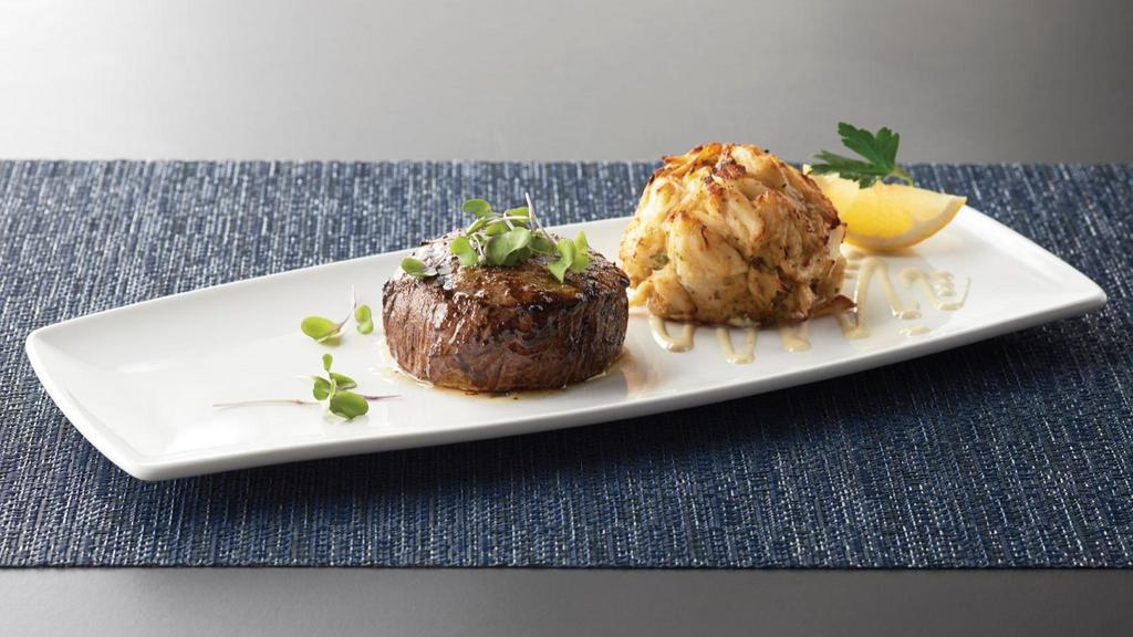 Steak And Cake · 6 oz center cut filet paired with Chesapeake Bay style crab cake.