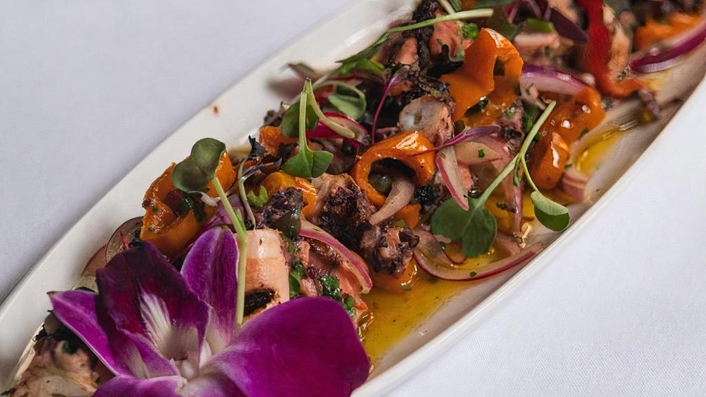 Grilled Octopus · Sweet peppers, red onion, capers and red wine vinegar.