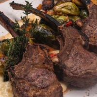 Grilled Lamb Chops · Served with creamy polenta and roasted brussels sprouts.