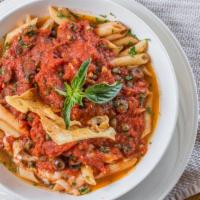Penne Puttanesca · Imported plum tomatoes, capers, black olives, hint of anchovies.
