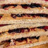 Pb&J · Peanut Butter and Jelly on 3 pieces of country white bread.