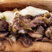 Cheese Steak · Philly Cheese Steak thinly sliced rib-eye, caramelized onion, Green bell peppers and melted ...
