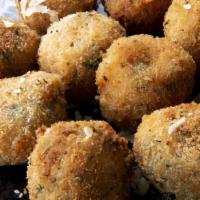 Arancini (Rice Balls) · Arancini are delicious, crispy, deep fried Sicilian balls of rice. They have a meat sauce an...
