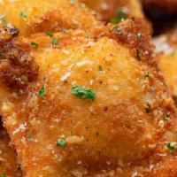 Fried Ravioli · Fried Ravioli are cheese ravioli fried in an air fryer or in oil and topped with parmesan ch...
