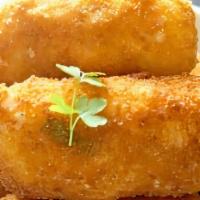 Potato Croquettes · My Baked Cheesy Potato Croquettes are an easy bite-sized snack or side dish. Mashed potato, ...