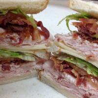 Turkey Club · Served on Triple Decker Rye
Bacon, Lettuce, Tomato, Mayo