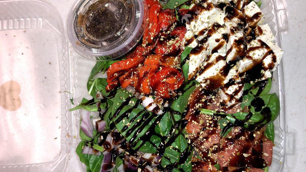 Caprese Salad · Fresh Mozzarella with Tomatoes, Roasted Red Peppers, Red Onions with Balsamic Glaze over Mixed Greens and a side of Balsamic Vinaigrette