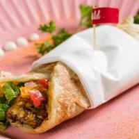 Butter Wrap · Flame grilled chopped chicken tenders with lettuce, red onions, bell peppers, sauces in a bu...