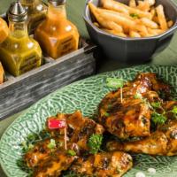 Peri For Two · Flame grilled half chicken, five chicken wings, and two sides of your choice.