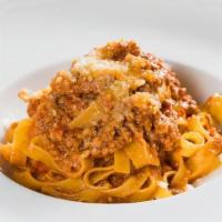 Fettuccine Alla Bolognese · traditional veal raguÌ, 24-month aged Parmigiano-Reggiano