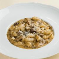 Gnocchi Alla Norcina · gluten-free gnocchi, mushroom ragù, black truffle