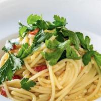 Spaghetti Aglio, Olio E Peperoncino · traditional Sant Ambroeus spaghetti, garlic, peperoncino, fresh parsley, extra virgin olive ...