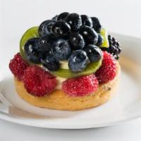 Torta Di Frutta · sable dough crust filled with vanilla bean custard, topped with seasonal fruits