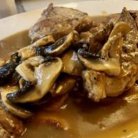Pork Chop With Mushroom · Pan-fried pork chops sauteed with fresh mushrooms in a creamy mushroom sauce.