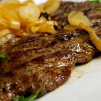 Steak With Onion · Choice cut, sirloin tip thinly sliced and marinated in our house blend. Grilled and served w...