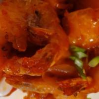 Spicy Fried Shrimps · Fried shrimps tossed in our delicious Mamacita sweet and spicy sauce served with a small sla...