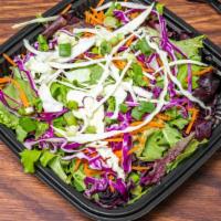 Slaw Salad · Mix greens, red and green cabbage, carrots, sesame sticks, green onions. Served with a balsa...