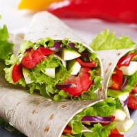 Greek Wrap · Delicious Breakfast Wrap made with Eggs, tomatoes, feta, fresh spinach, and mushrooms. Serve...