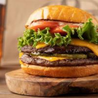 Char Double · Two All Beef Patties, American Cheese, Minced Onion, Pickles, Lettuce, Tomato, and Secret Sa...