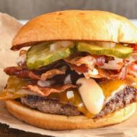Bacon Burger · All Beef Patty, Cheddar Cheese, Crispy Bacon, Minced Onions, Pickles, and Secret Sauce on a ...