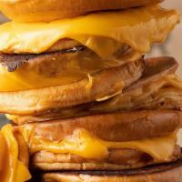 Grilled Cheese · Melted American Cheese on a Grilled Brioche Bun.
