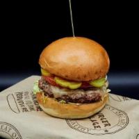 Village Bison Burger · Grass-fed, antibiotic and hormone free, hand formed patty.