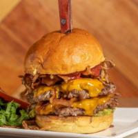 Zeus Burger  · Double beef stack burger, smoked cheddar, bacon, guacamole, crispy onions strings, raspberry...
