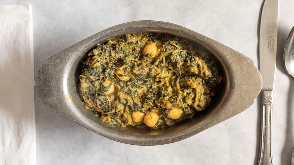 Chana Sag · Chickpeas and spinach cooked with mild or hot spices.