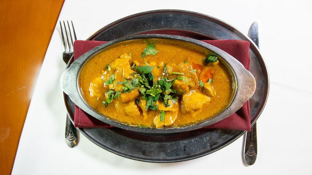 Tikka Masala · Boneless broiled meat, cooked with special tandoori spices. Served with saffron rice, dal, onion relish, tamarind sauce and hot mint sauce.