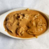 Curry · Tender pieces of meat cooked in lightly spiced gravy. Served with saffron rice, dal, onion r...
