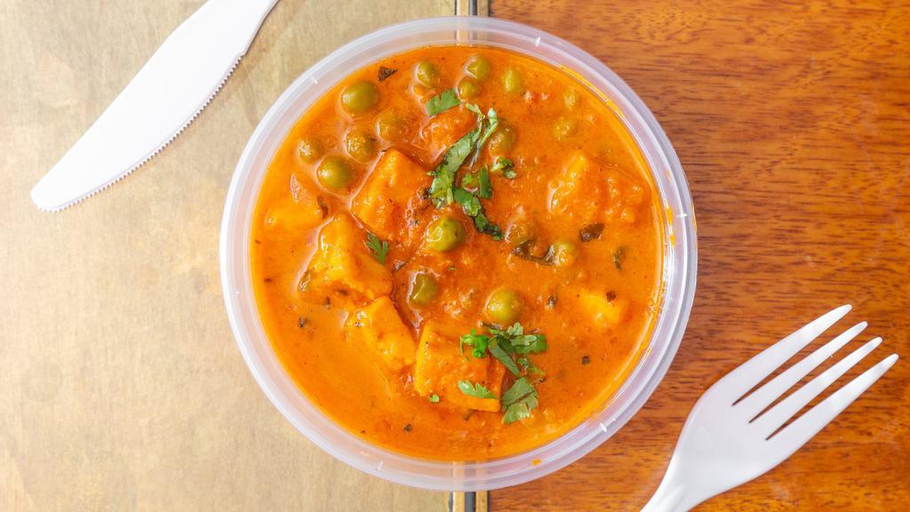 Matar Paneer - Regular · Peas and cottage cheese cooked in tomato onion sauce.