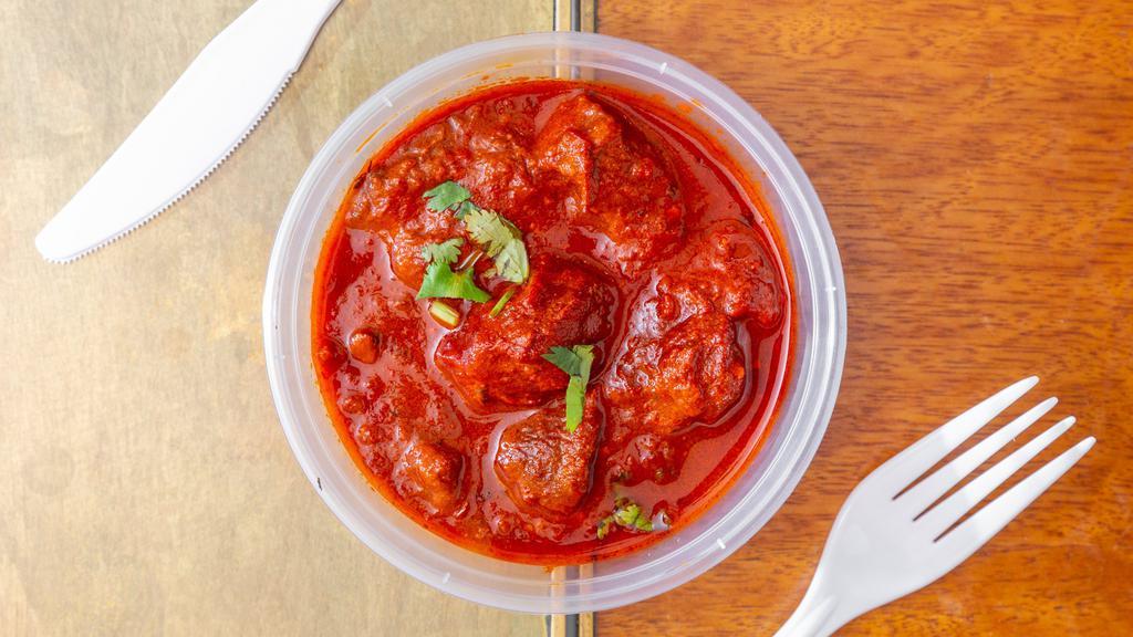Beef Vindaloo · Beef cubes cooked in tangy and spicy tomato sauce.