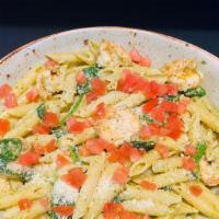 Shrimp & Penne Genovese · Pesto, Spinach, Tomato, Toasted Pine Nuts, Parmesan.