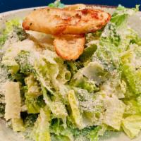 Caesar Salad · Romaine Hearts, Parmesan, Crostini. Caesar Dressing.