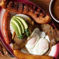 Bandeja Paisa · Paisa Platter, Steak, with rice, beans ,egg, pork skin , Colombian sausage, avocado and swee...
