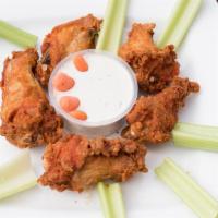 Taphouse Wings · Fried and finished on the grill. Served with our house sauce or with classic buffalo sauce w...