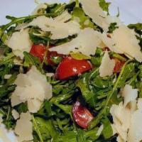 Insalata Di Rucola · Vegan. Arugula salad, cherry tomatoes, parmigiano cheese, balsamic vinagrette.