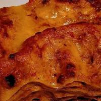 Lasagna Tradizionale · Tradizional bolognese lasagna with grass fed beef ragout, bechamel sauce, parmigiano cheese,...