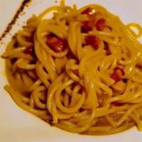 Spaghetti Alla Gricia Con Tartufo · Homemade spaghetti, white wine sauce, pancetta, parmigiano cheese, truffle oil.