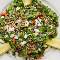 Quinoa Avocado Salad · Tri-colored quinoa, red bell peppers, sweet red onion and feta cheese on a bed of shredded s...
