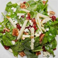 Spinach Salad · Baby spinach, cranberries, candied pecans, pears, feta cheese with a lemon-basil vinaigrette...
