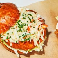 Shrimp Burger · Crispy shrimp patty, Wasabi coleslaw, Lettuce with Homemade Garlic Aioli comes with French F...