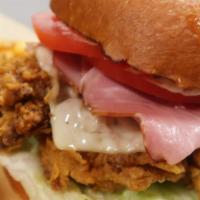 Monster Spicy Chicken Burger · Ham, Fontina cheese, Lettuce, Pickled Shallots with aioli comes with French Fries