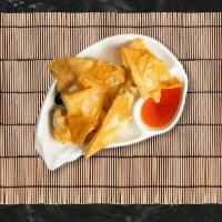 Crab Rangoon · Fried imitation crab meat, celery and cream cheese served with sweet chili sauce.