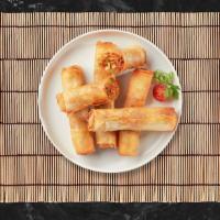 Rolling Through The Spring · Seasonal vegetables wrapped in rice wrapper and fried until golden crisp.