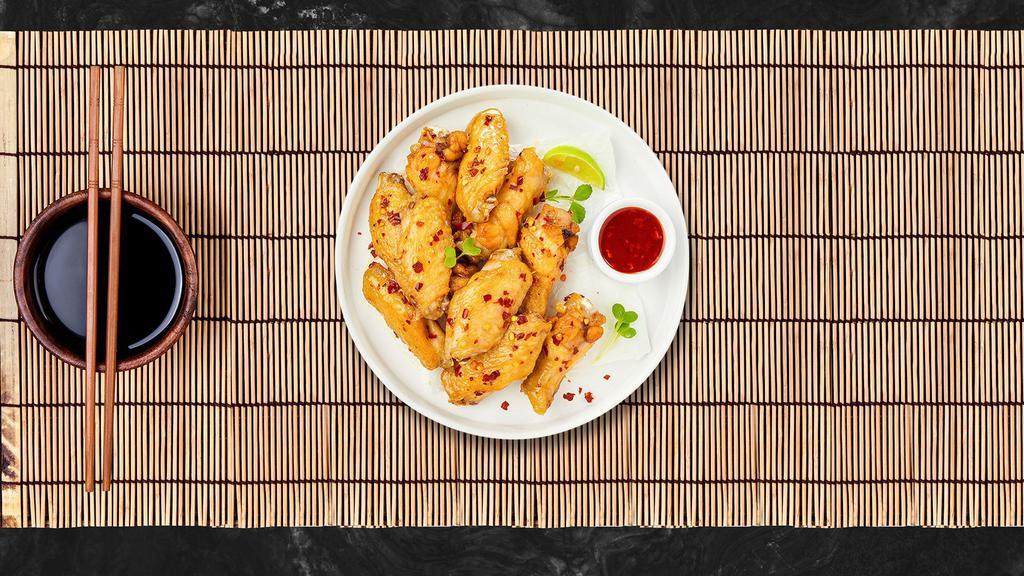 Thai Wing It · Thai-style chicken wings. Served with sweet chili sauce.