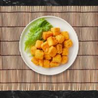 Golden Tofu · Fried tofu. Served with sweet chili sauce and crushed peanut.